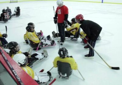 coaching hockey sur luge